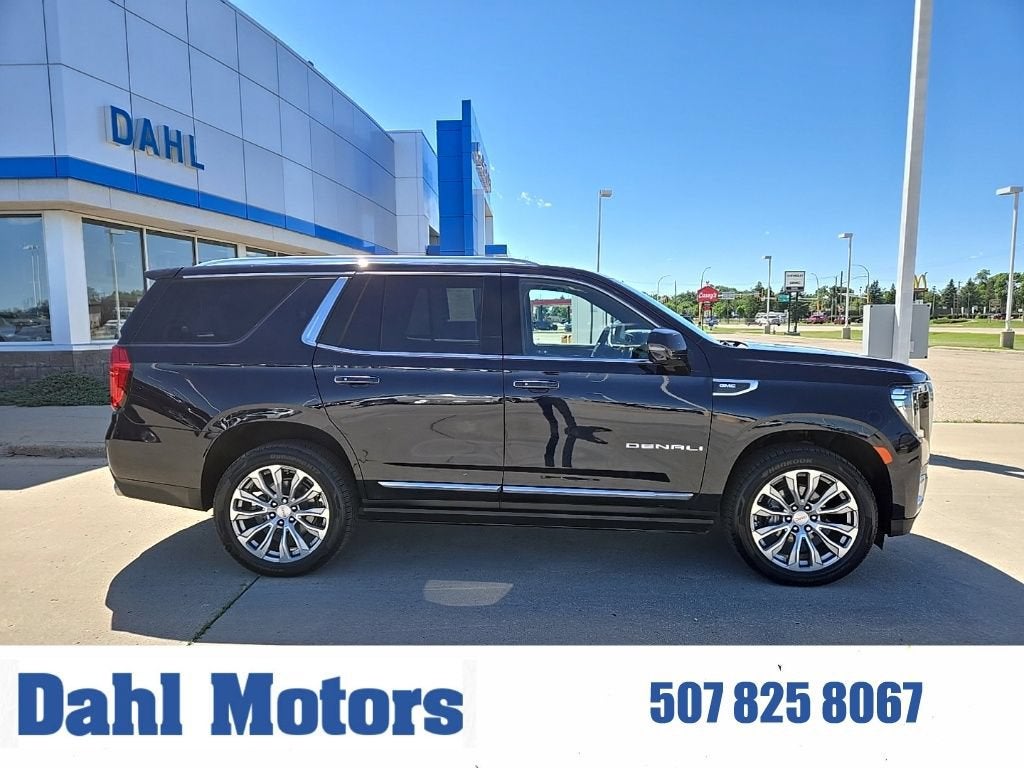 2022 GMC Yukon Denali in Midnight Blue Metallic — front three-quarter view