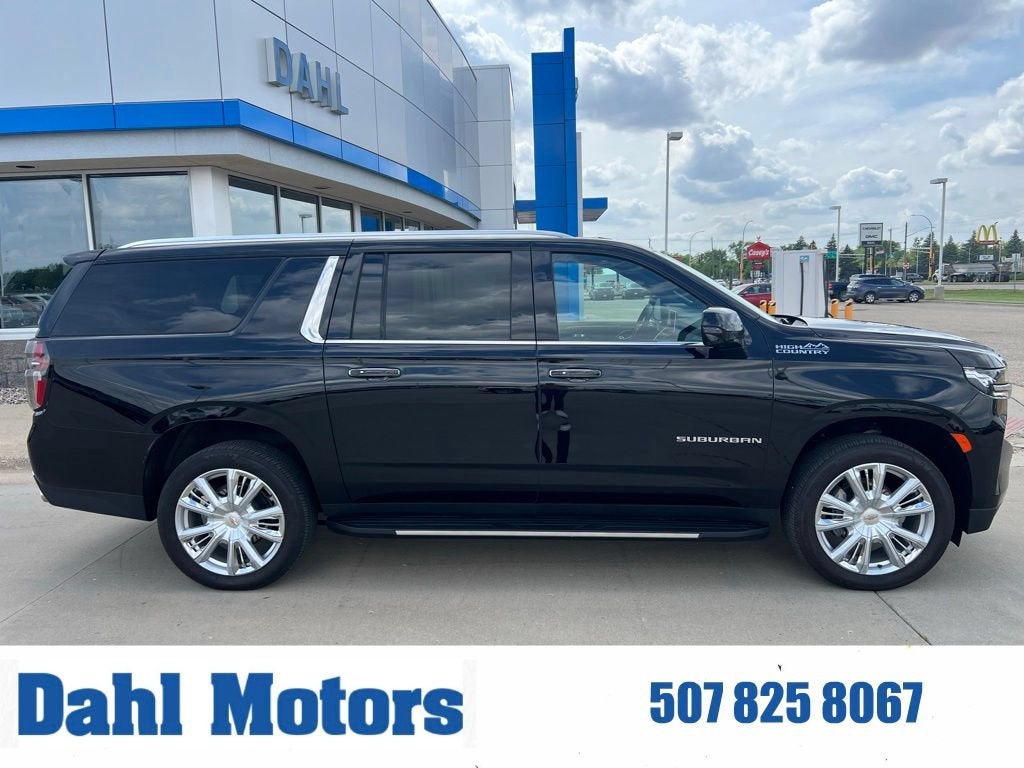 2024 Chevrolet Suburban High Country in Black — front three-quarter view