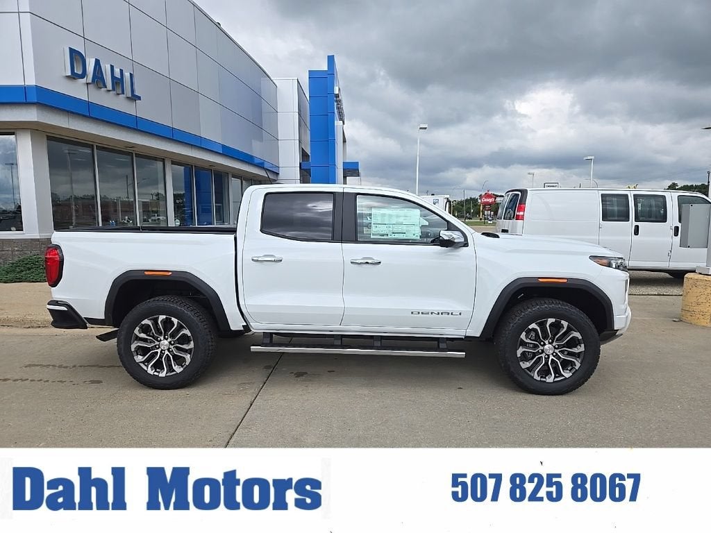 2026 GMC Canyon Denali in Summit White — front three-quarter view