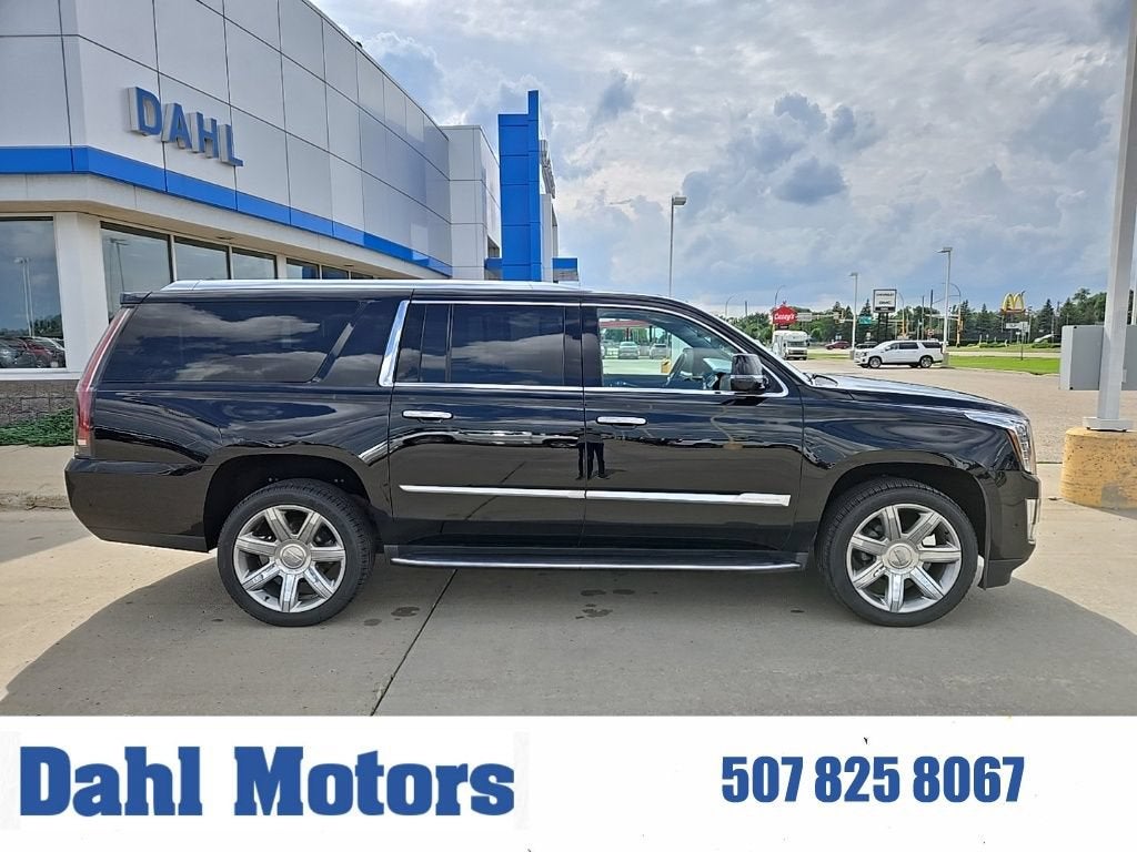 2019 Cadillac Escalade ESV Luxury in Black Raven — front three-quarter view