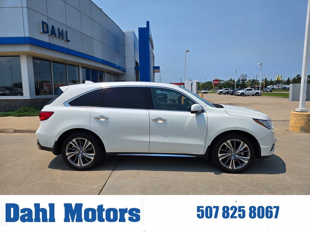 2017 Acura MDX w/Technology Pkg in White — front three-quarter view